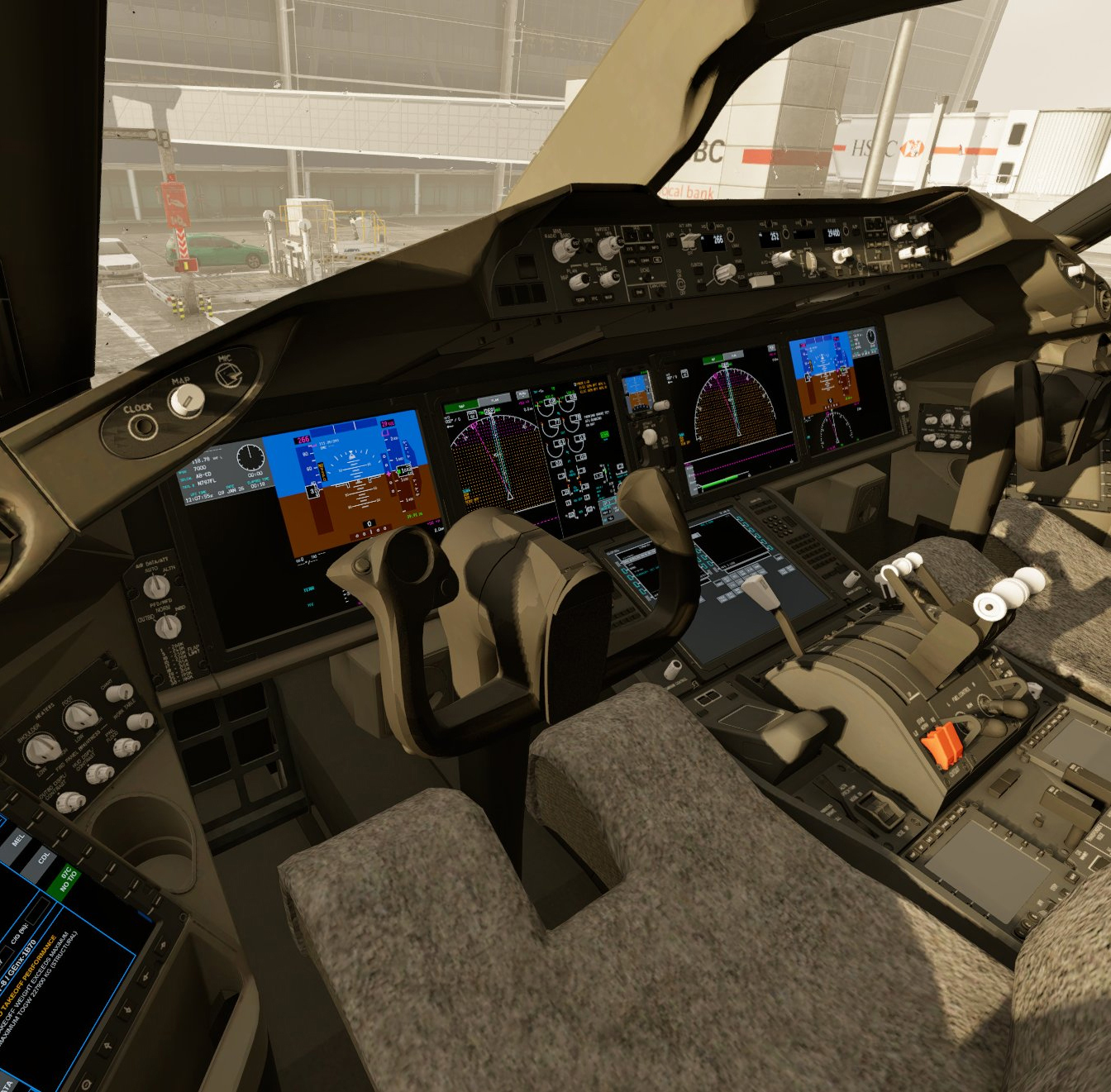 The FLS 787-8 flight deck from the captain's seat, at the gate